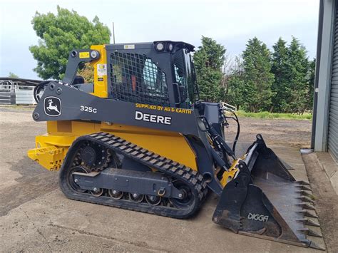 yellow skid steer|john deere skid steer loader.